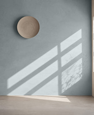 Korqstuc Iron grey op de muur