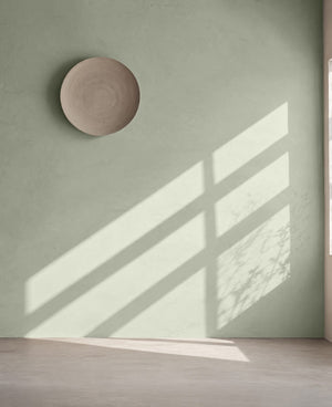 Korqstuc Olea op de muur