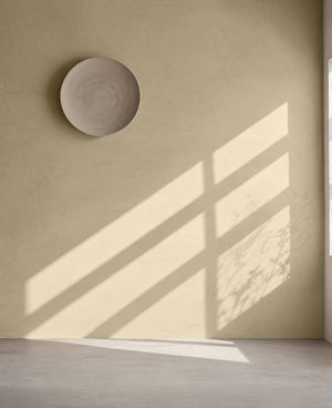 Korqstuc Olia op de muur