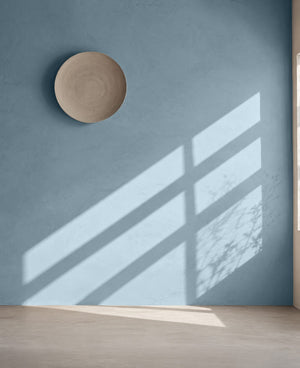 Korqstuc Shell op de muur
